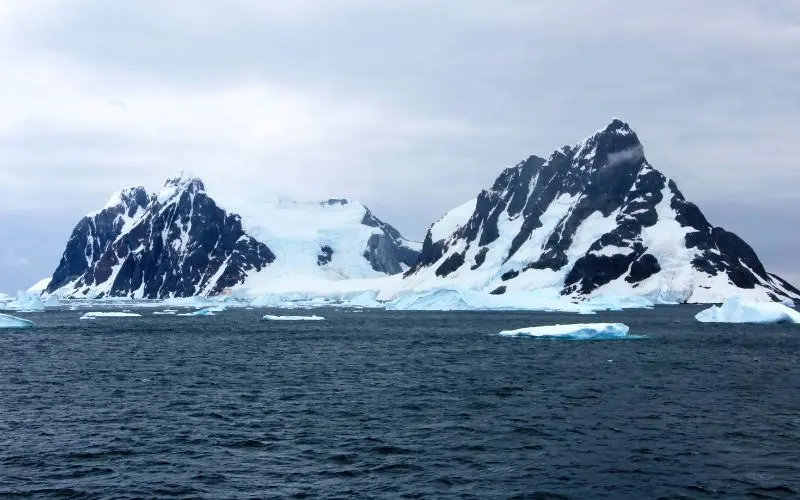 Best Places To Visit In Antarctica (2026 Travel Guide) Rugged mountains in antarctic peninsula