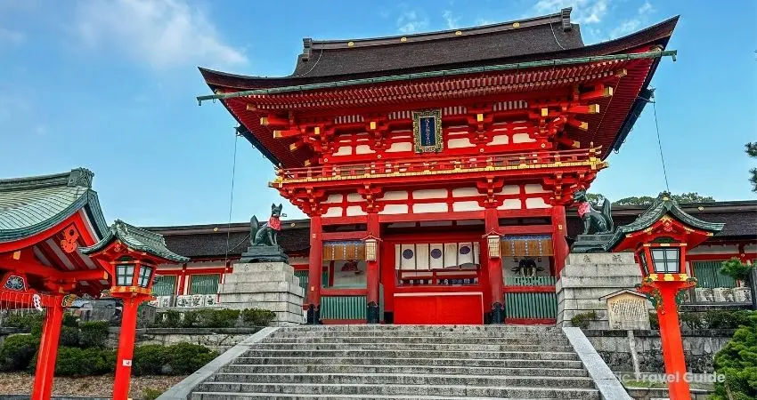 Fushimi inari taisha with traditional japanese architecture and red gates