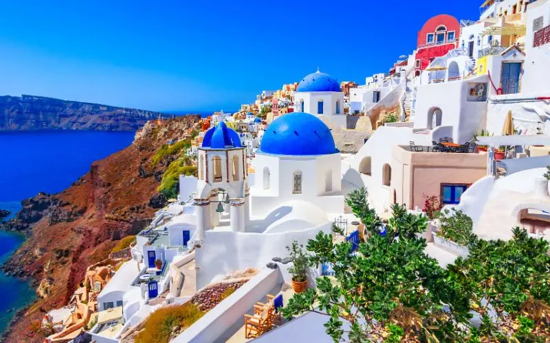 Whitewashed houses overlooking the aegean sea in greece