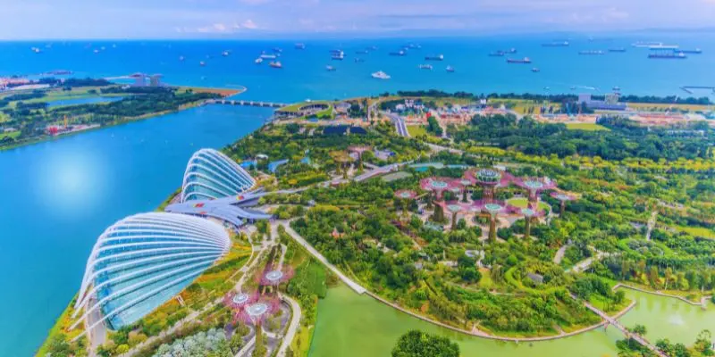 Want A Safe Trip To Asia? These Are The 10 Safest Countries In Asia (2026) Panoramic view of singapore city showing organized urban streets