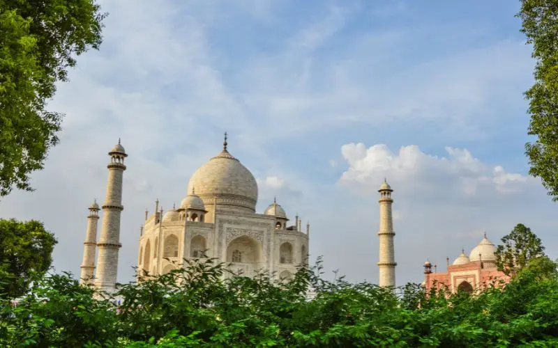 Taj mahal in agra, india view from greenery