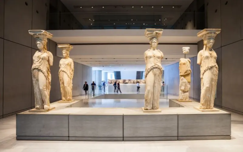 Top Things To Do In Athens, Greece (Attractions &Amp; Travel Guide) Interior of acropolis museum in athens with ancient artifacts