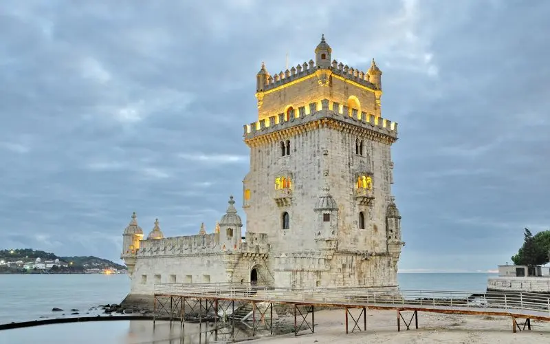 The Best Things To Do In Lisbon Portugal In One Trip Belém tower overlooking the tagus river in lisbon