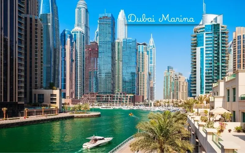 Dubai marina skyline with yachts and waterfront buildings