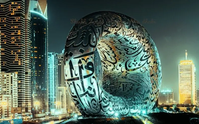 Museum of the future, dubai uae, iconic architectural landmark on sheikh zayed road featuring futuristic ring design and arabic calligraphy facade
