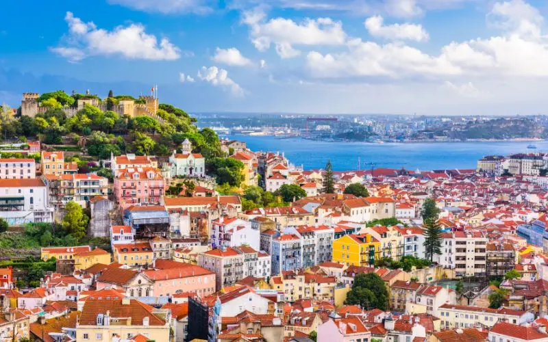 12 Best Countries To Visit In Europe: Top Picks For Your Next Vacation Lisbon streets and portugal’s atlantic coastline with colorful scenery