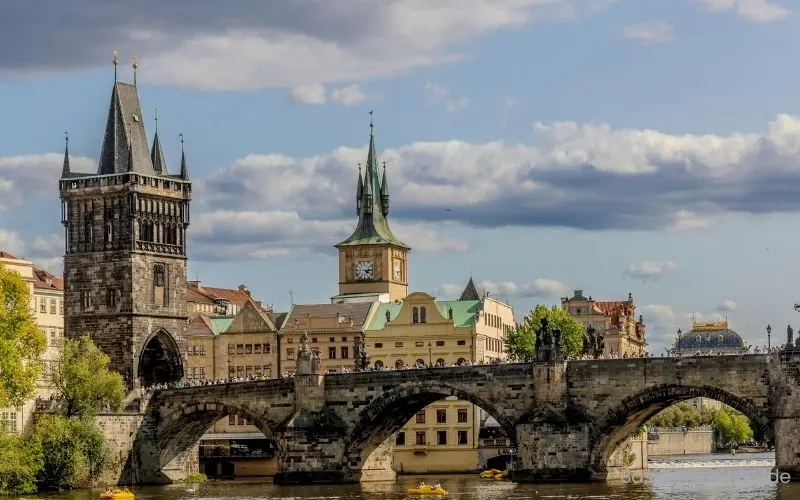 Charles bridge in prague with historic statues and vltava river, one of the best tourist destinations in the czech republic.