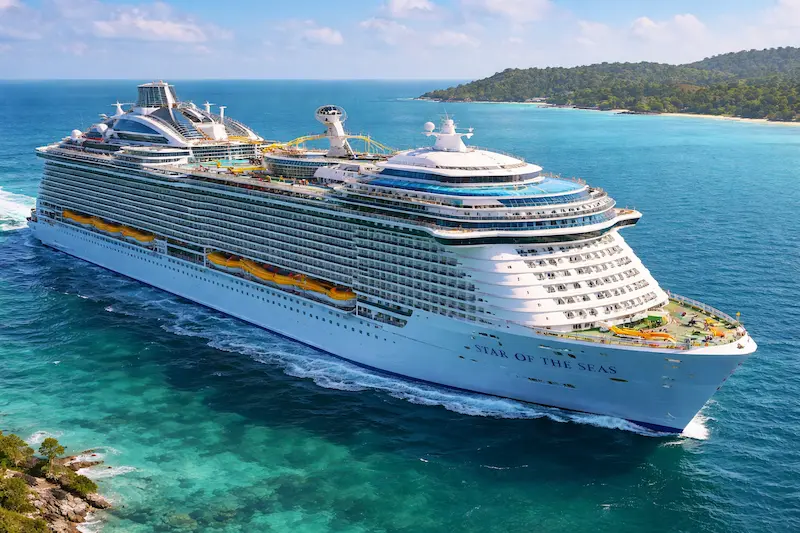 Top 10 Largest Cruise Ships In The World With Size Comparison And Chart Star of the seas, a massive royal caribbean cruise ship, sailing through clear turquoise waters