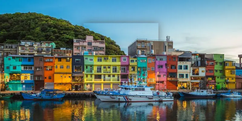 Want A Safe Trip To Asia? These Are The 10 Safest Countries In Asia (2026) Scenic view of taiwan’s colorful houses, popular with travelers