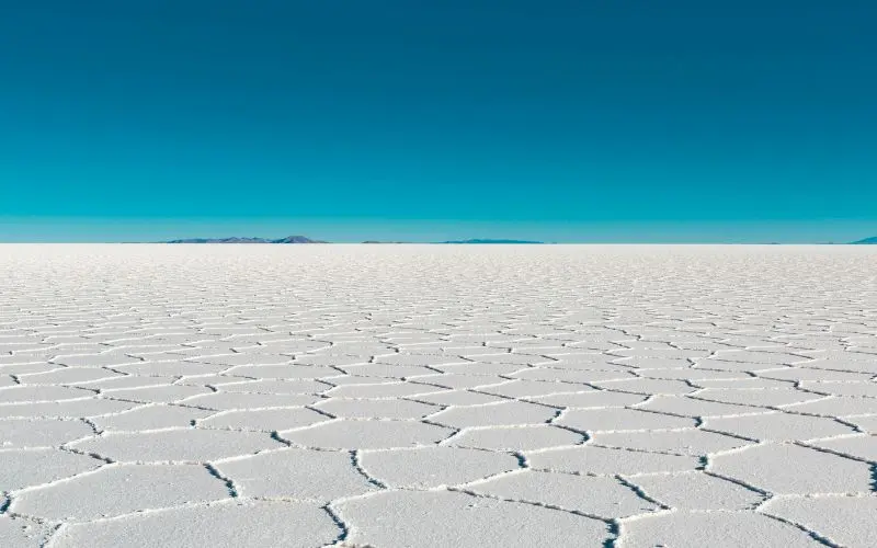 The 12 Best Countries To Visit In South America Salar de uyuni salt flats in bolivia with a stunning mirror-like landscape